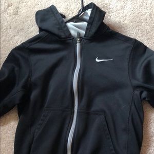 a black and grey nike sweater